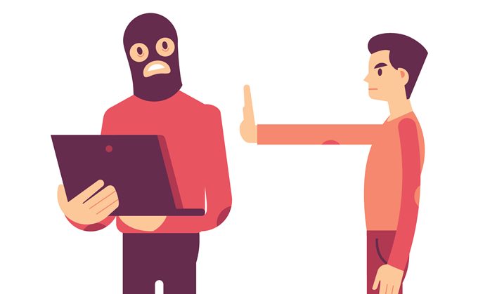 Image of a man stopping a thief from stealing his laptop