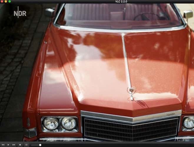 Image of a red Cadillac in VLC Player