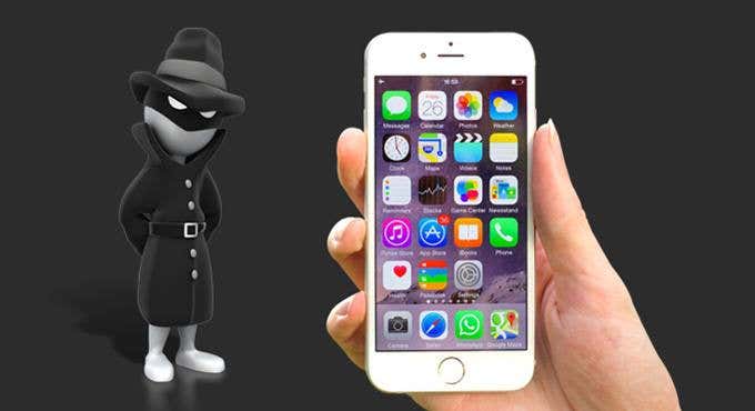 Cartoon image of a tiny spy next to a hand holding an iPhone