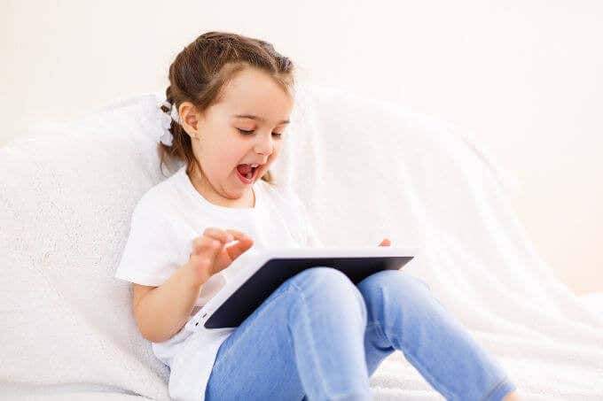 Child playing on an iPad
