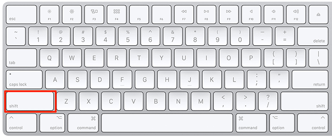 Apple Keyboard with Shift key highlighted 
