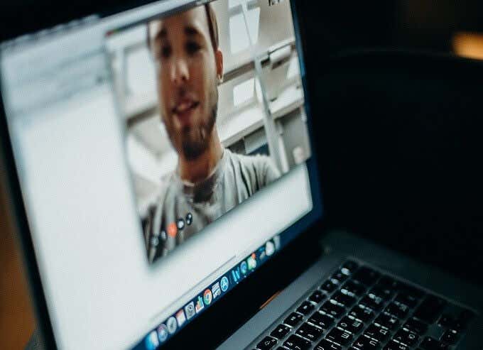 Someone using FaceTime on a laptop 
