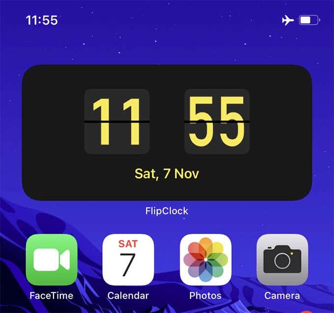 Flip Clock app clock widget on an iPhone Home Screen  