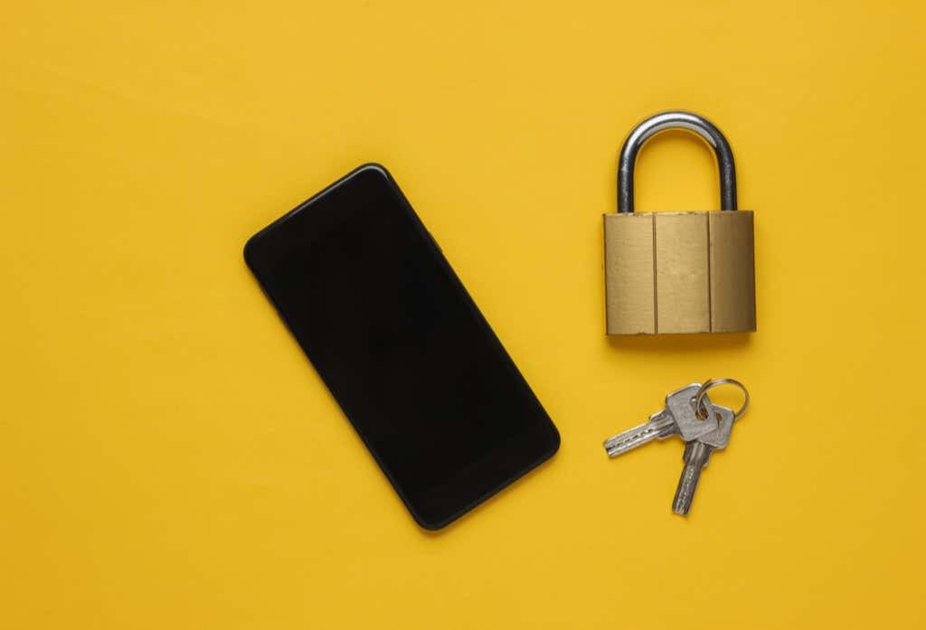 An iPhone with a padlock and a set of keys