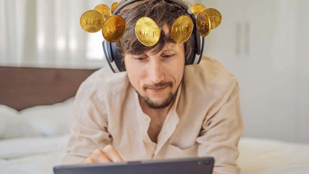 A guy with NFT coins around his head like a crown 