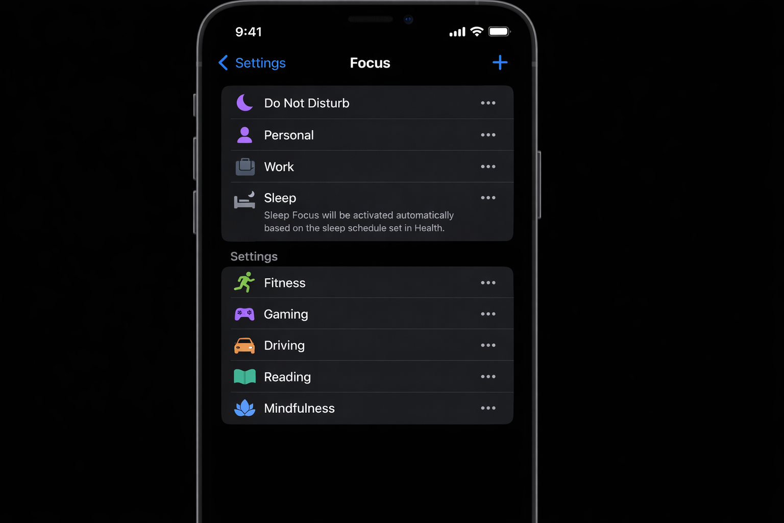 iPhone Settings app showing the Focus screen listing built-in Focus Modes including Work, Personal, Sleep, Driving, and Fitness with a plus button to add custom modes