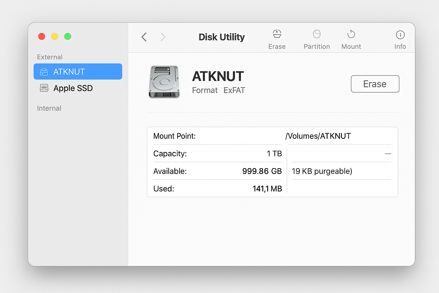 Disk Utility showing external drive selection and erase button