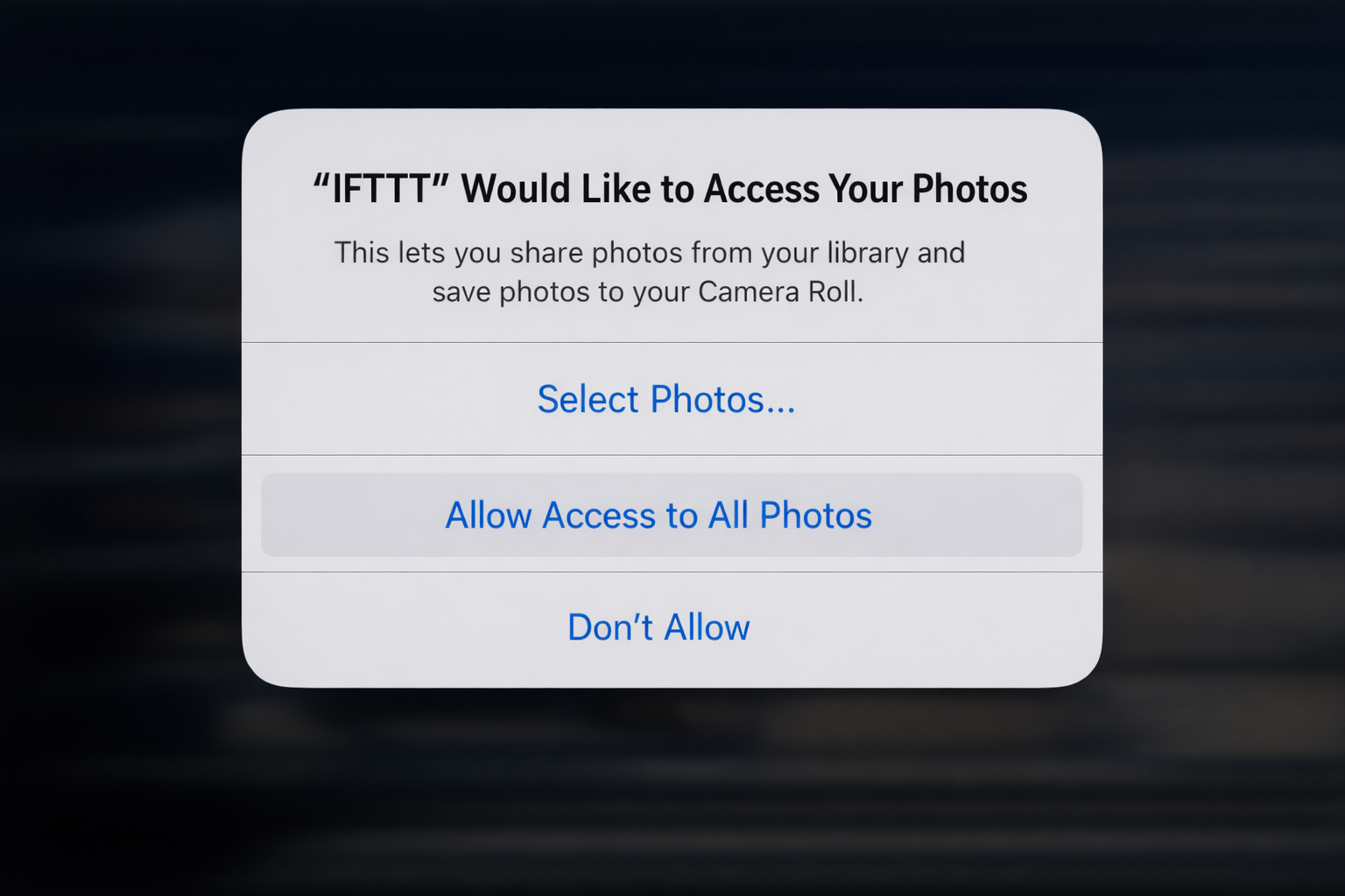 iOS permission prompt asking to allow IFTTT access to Photos, with the "Allow Access to All Photos" option highlighted