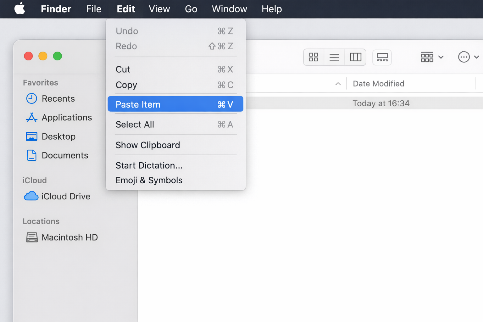 Finder window on macOS 26 showing a file being pasted via Edit > Paste, demonstrating Universal Clipboard file transfer between Macs