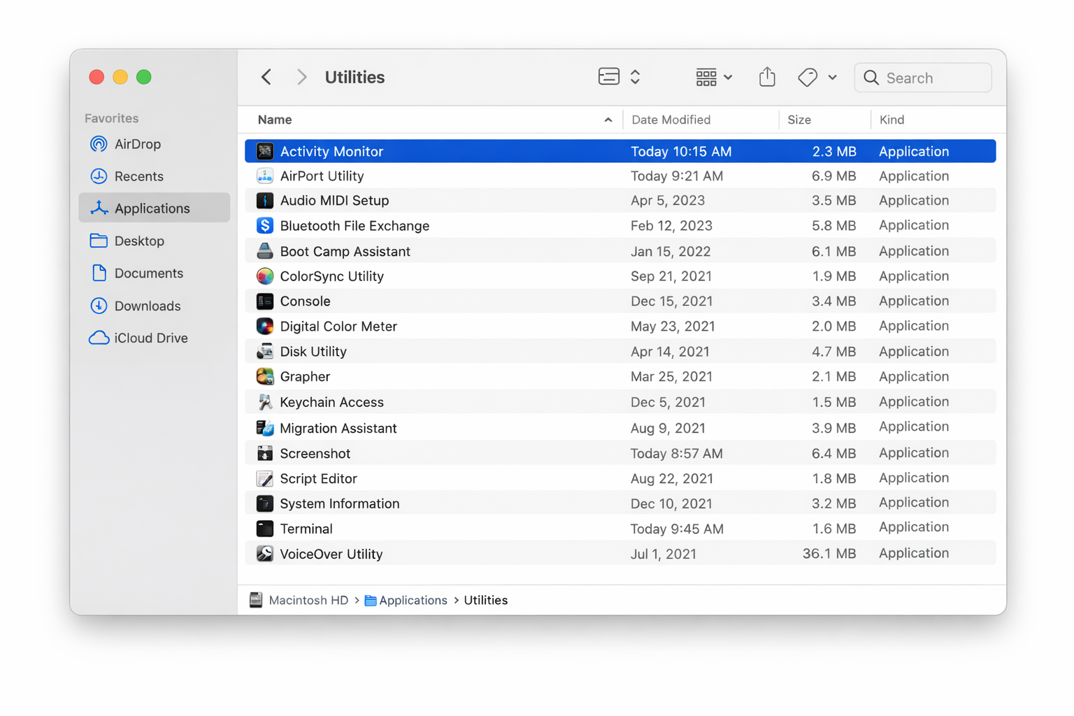 Finder window showing Applications > Utilities folder with Activity Monitor highlighted