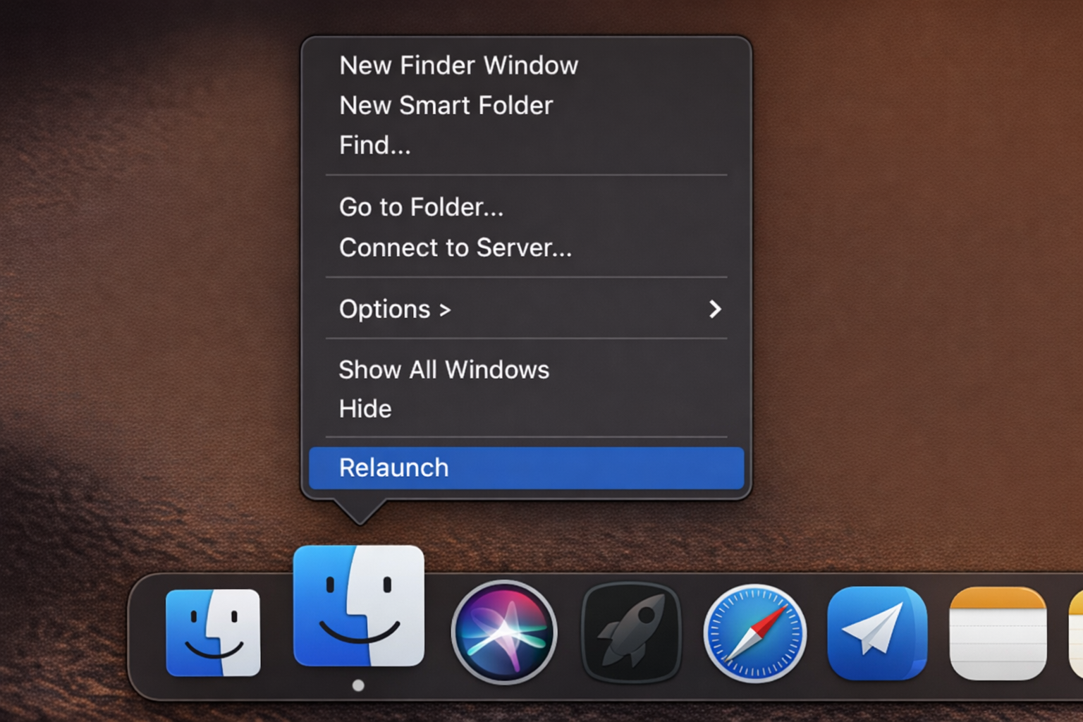 Finder icon in the Dock with a right-click contextual menu open, showing the Relaunch option highlighted (Option key held to reveal it)