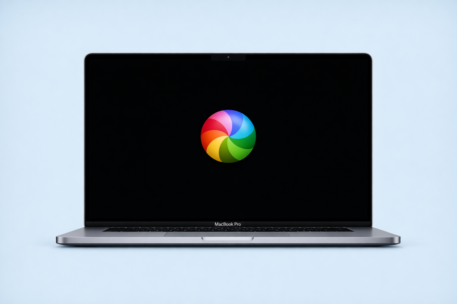 macOS desktop showing a MacBook with the spinning beachball cursor visible, indicating system slowdown