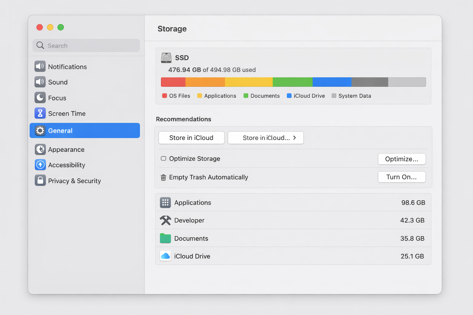 macOS System Settings > General > Storage showing the visual storage breakdown bar with categories including Apps