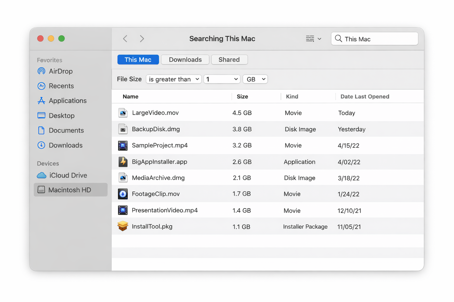 Finder search window with scope set to This Mac and a file size filter applied showing files greater than 1GB, results