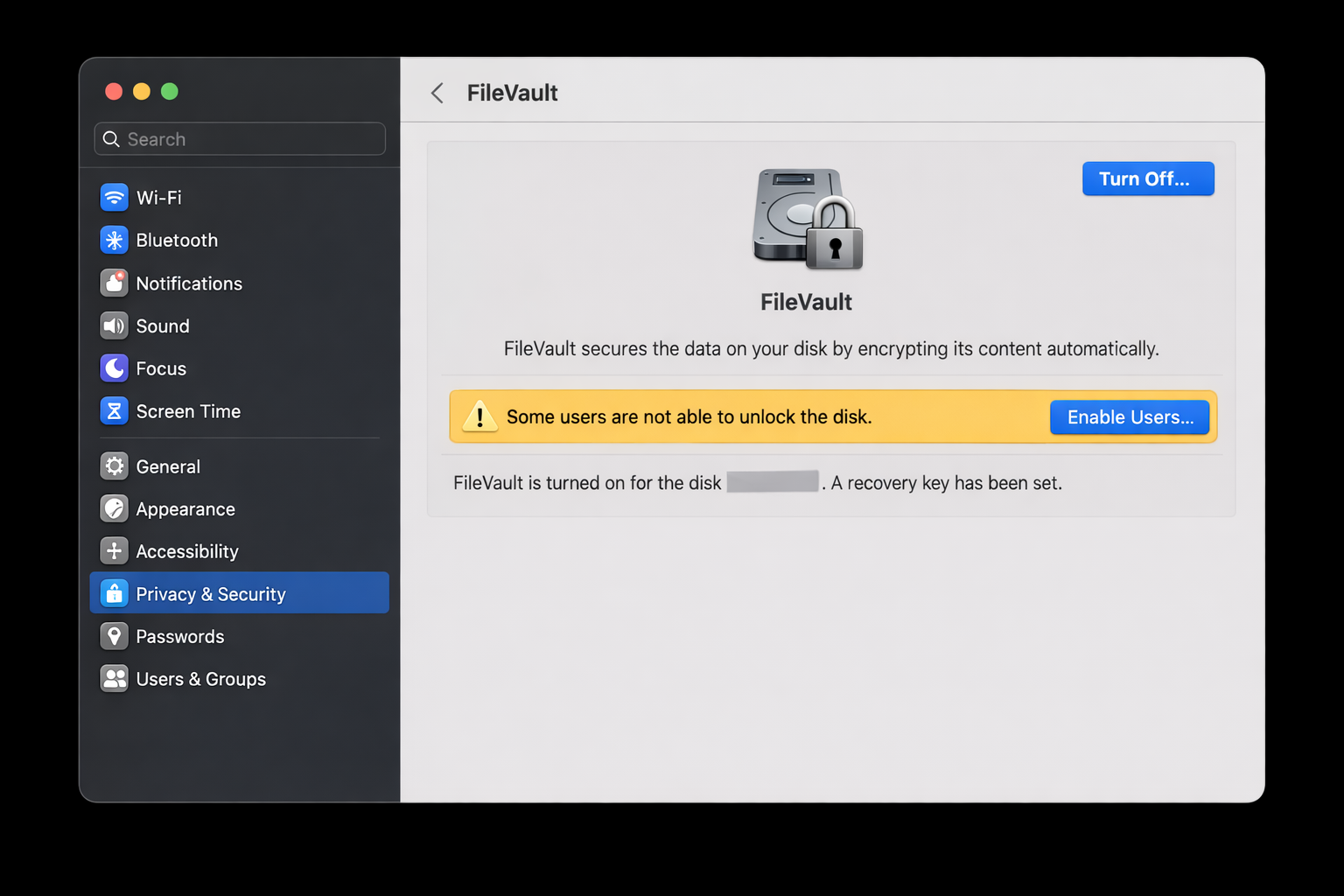 macOS Sequoia System Settings > Privacy & Security > FileVault with FileVault turned on and a confirmation message visible