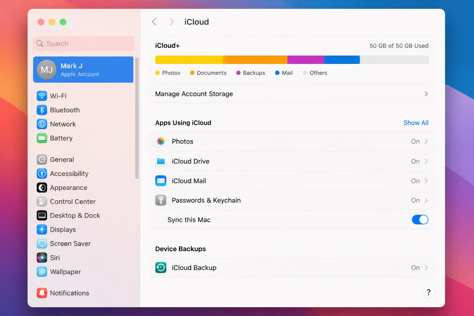System Settings showing the iCloud section with the Passwords & Keychain row and its sync toggle visible, under the Apple Account name
