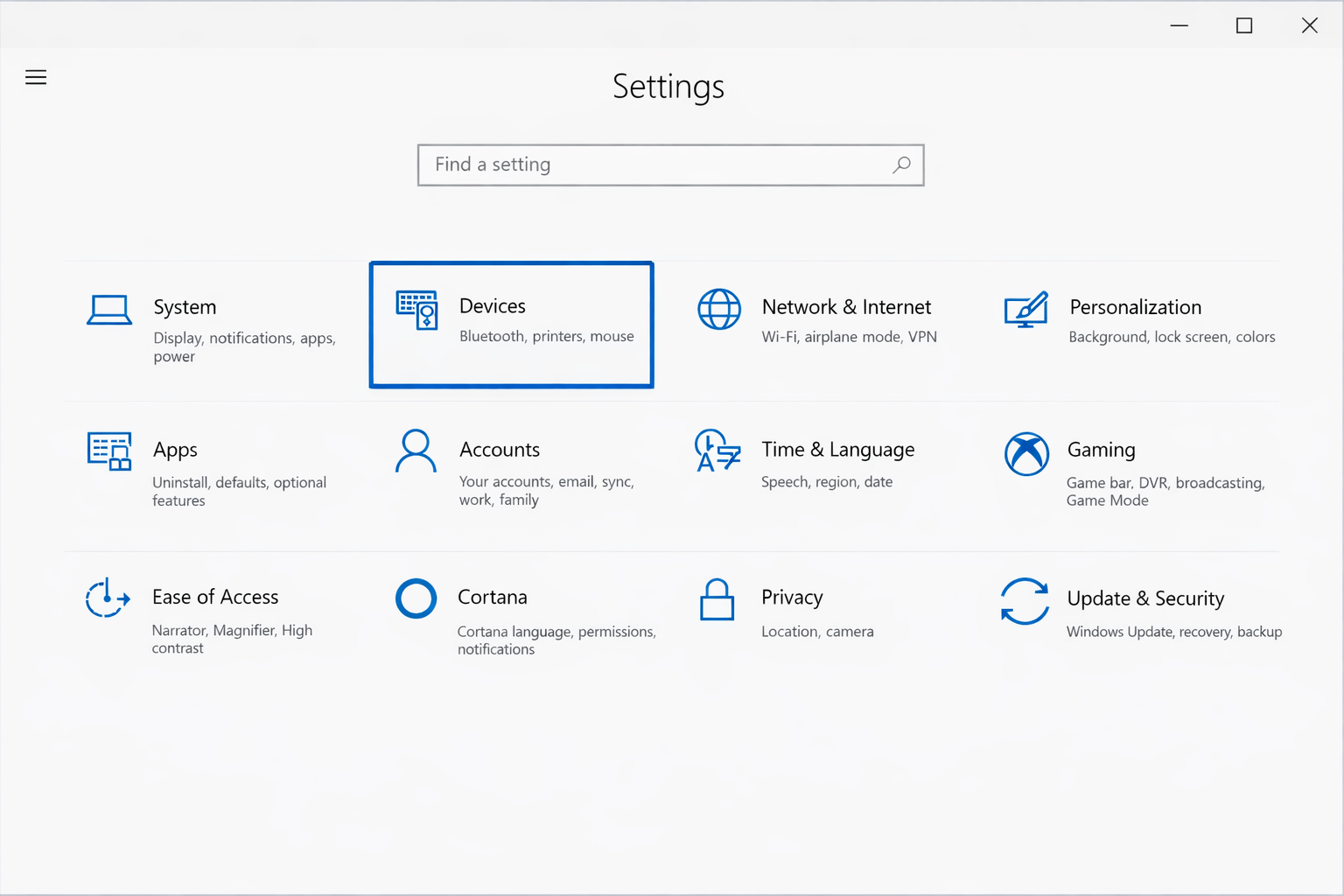 Windows 10 Settings app showing the Devices section highlighted in the main Settings grid
