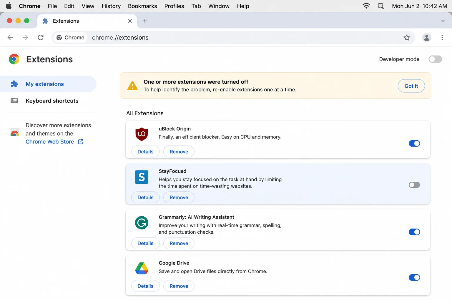 Chrome Extensions page with extension switches visible and a note to re-enable extensions one at a time