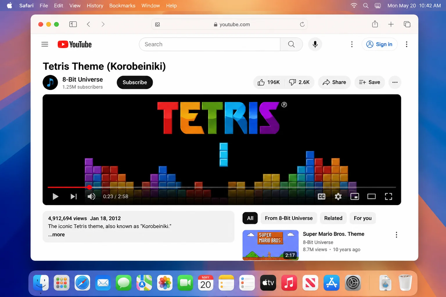 YouTube video page playing the Tetris theme with the video title, channel name, and playback controls visible
