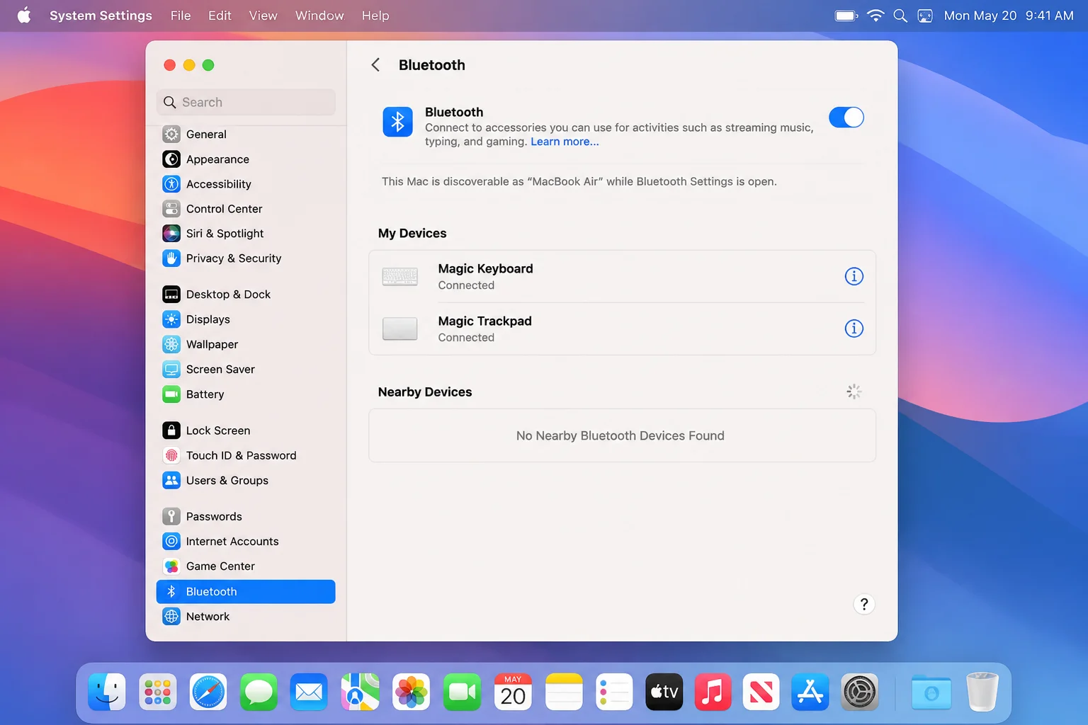 macOS System Settings Bluetooth pane showing Bluetooth turned on and paired keyboard/trackpad devices