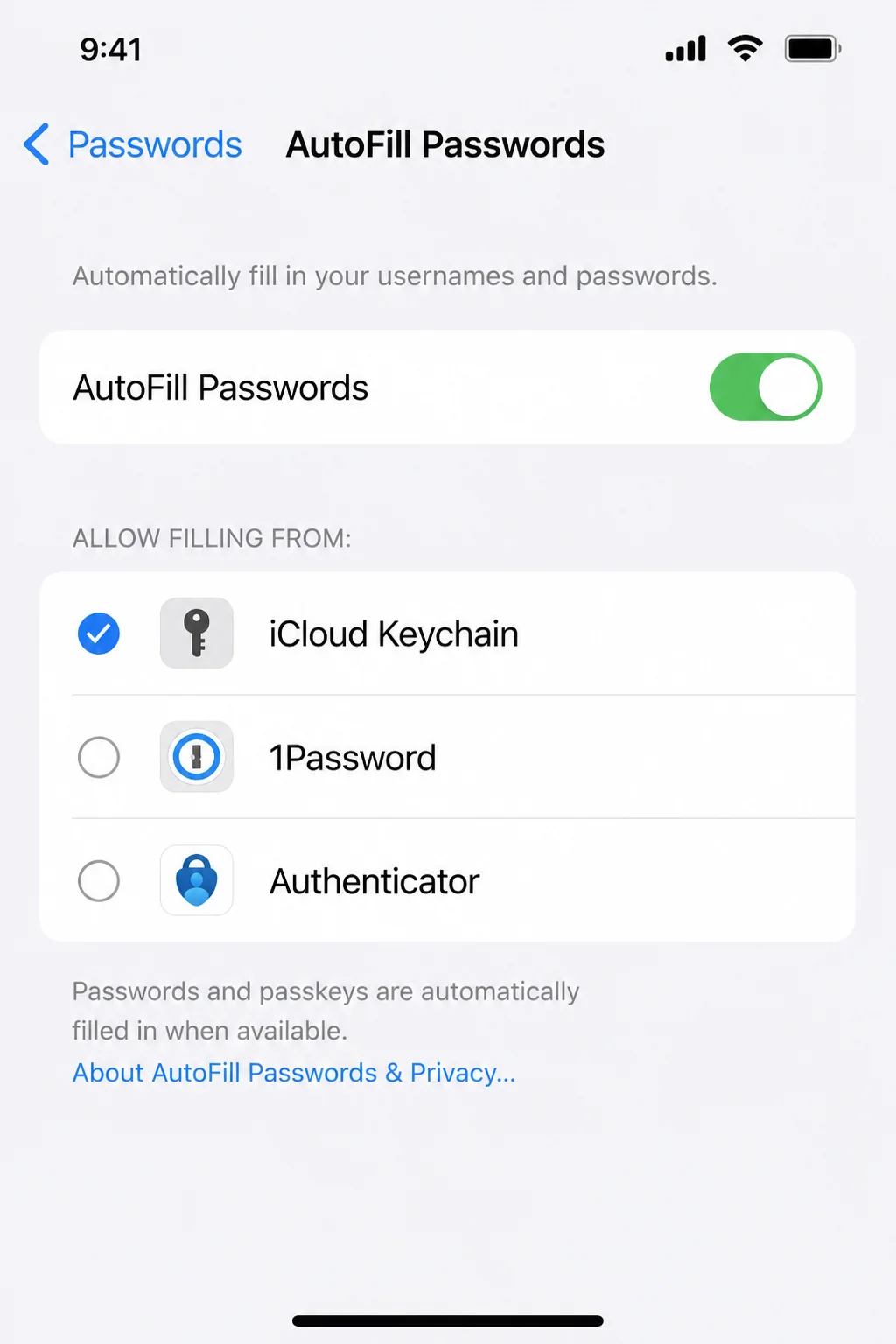 iPhone AutoFill and Passwords settings showing available password providers, with account information hidden