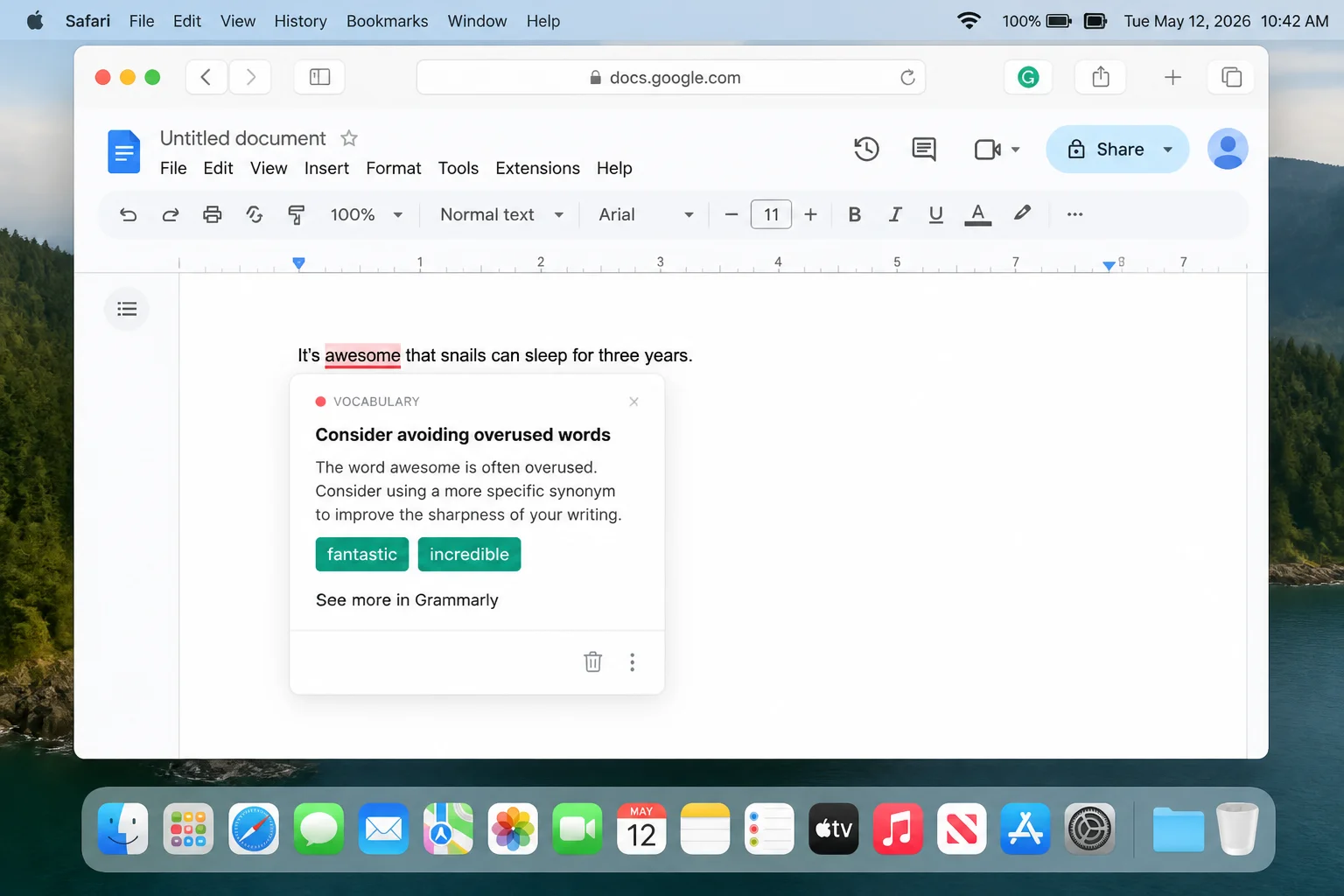 Safari webpage with the Grammarly extension active in a text field and a grammar correction suggestion expanded